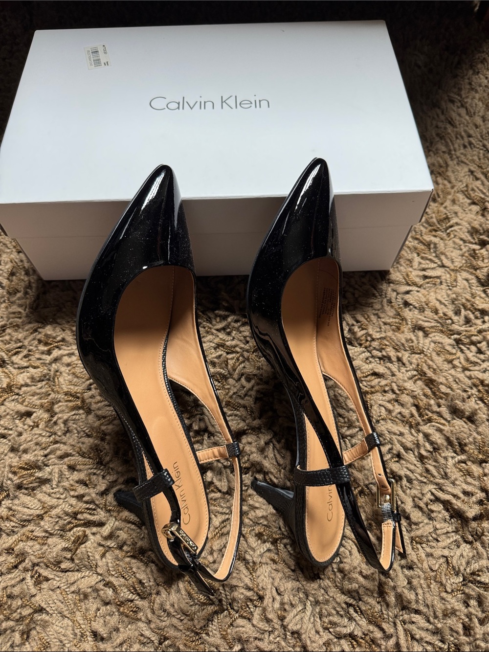 Like new Calvin Klein Patsi Patent Leather slingbacks. Size 8.5M